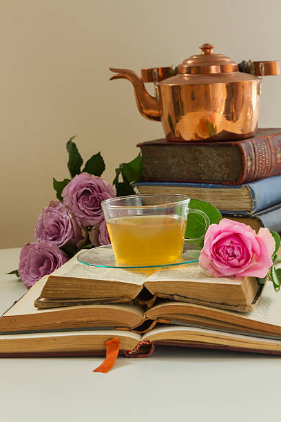 istock Cup of tea with books 595335088