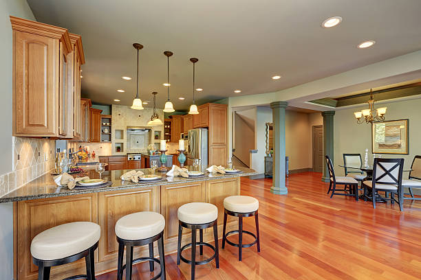 istock Luxury kitchen room interior with cabinets and granite counter tops 595335656