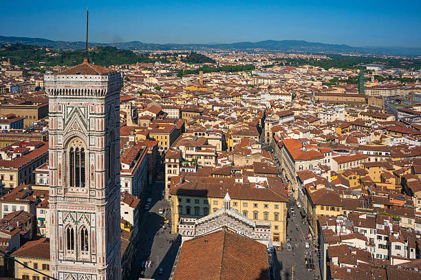 istock Giotto's Campanile in urban landscape 595336724
