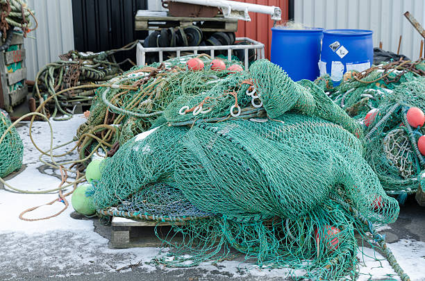 istock professional fishing net in the harbour 595337702