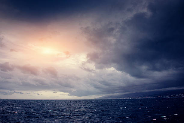 istock cumulus clouds over the sea 595338590