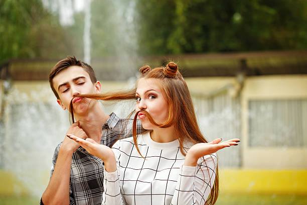 istock Enamoured teenagers fooling around. 595340162