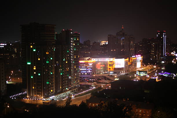 istock Aerial night illuminated cityscape view 595341960