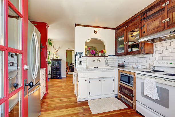 istock Vintage kitchen cabinets and white tile back splash trim 595343146