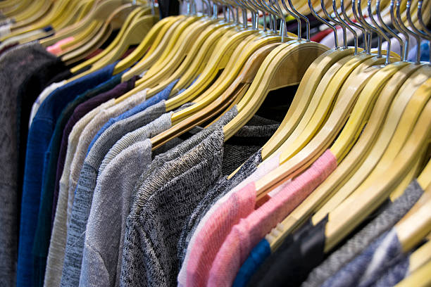 istock Close up clothes hanger and Knitting sweater 595347748