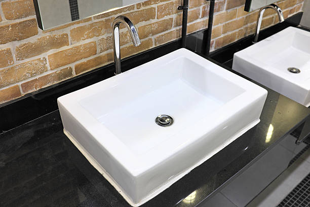 istock sink in the Toilet 595348548