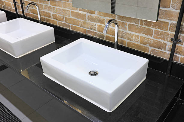 istock sink in the Toilet 595348668
