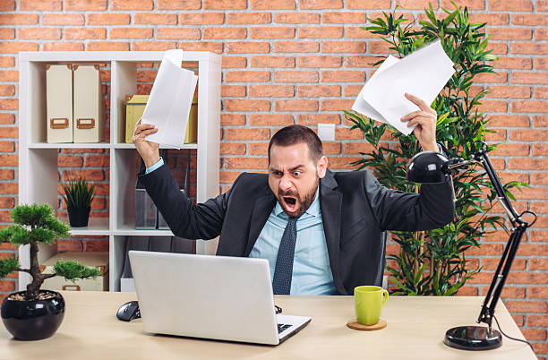 istock Angry businessman at office 595350600