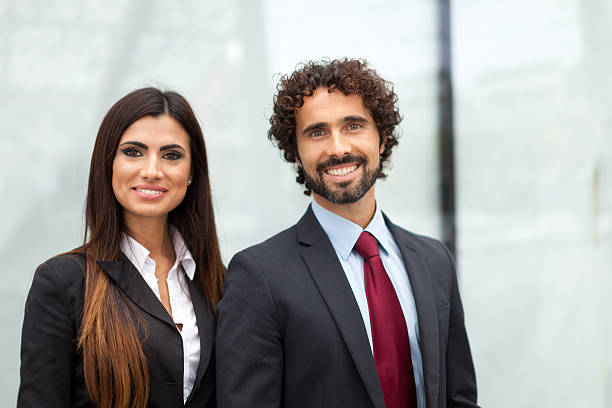 istock Smiling business people 595354466