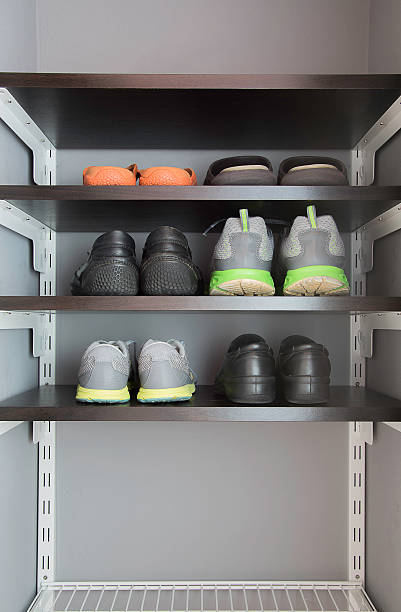 istock Rack for shoes in small room. 595355846