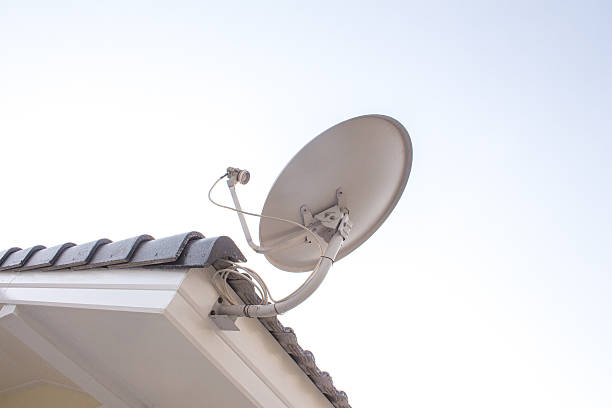 istock satellite antenna on the roof house 595356374