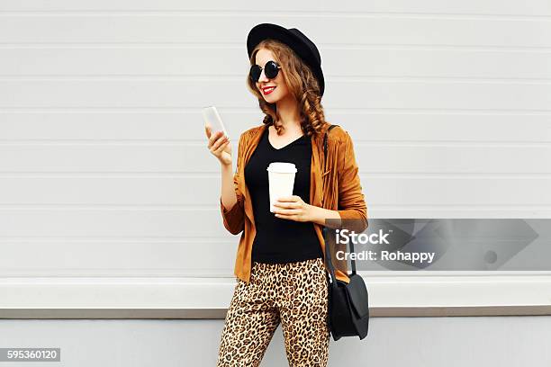 Autumn Luxury Pretty Woman Coffee Cup Smartphone Walking In City Stock Photo - Download Image Now