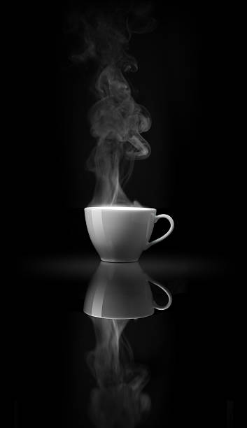 istock Smoke above white coffee cup on black mirror 595363590