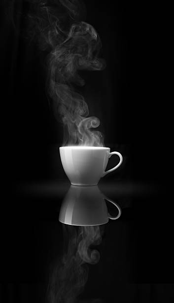 istock Smoke above white coffee cup on black mirror 595363608
