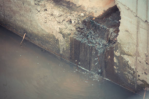 istock Toxic water running from sewers required dredging drain tunnel cleaning 595365168