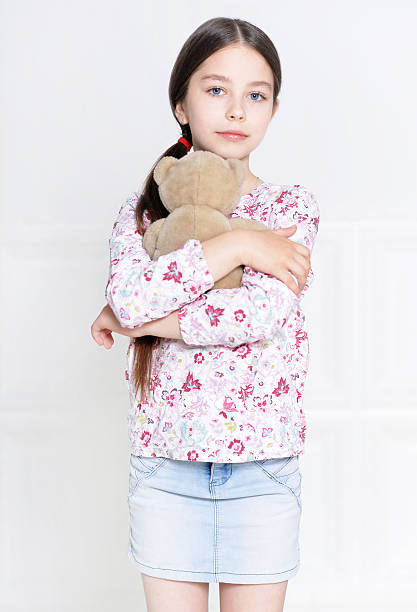 istock cute little girl posing 595366264