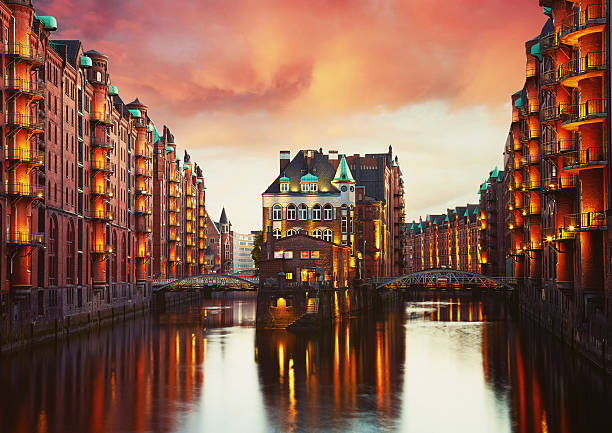 istock Old Speicherstadt in Hamburg illuminated at night. 595366382