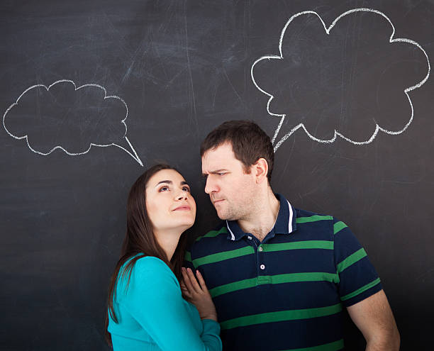 istock Young happy couple thinking. Chalk drawing 595366810