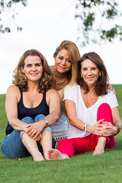 istock Mature women posing at the park 595367214