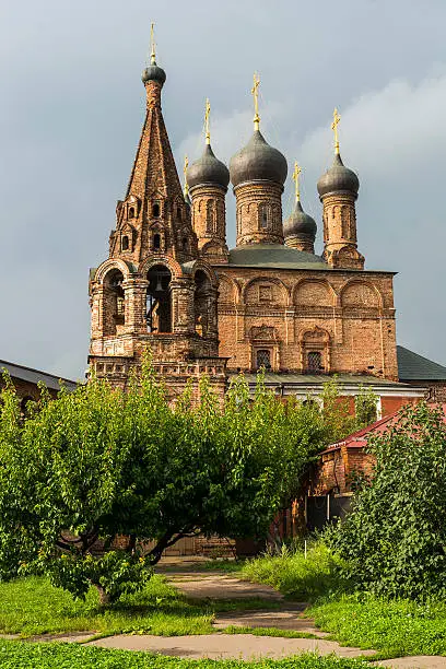 Photo of Orthodox Church against a beautiful sky with clouds, Russia, Moscow