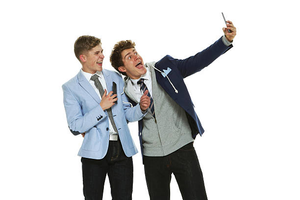 istock Cheerful brothers taking a selfie 595368358