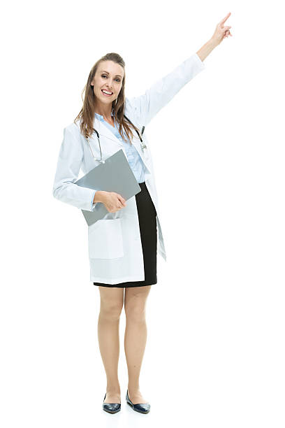 istock Smiling female doctor pointing away 595727458