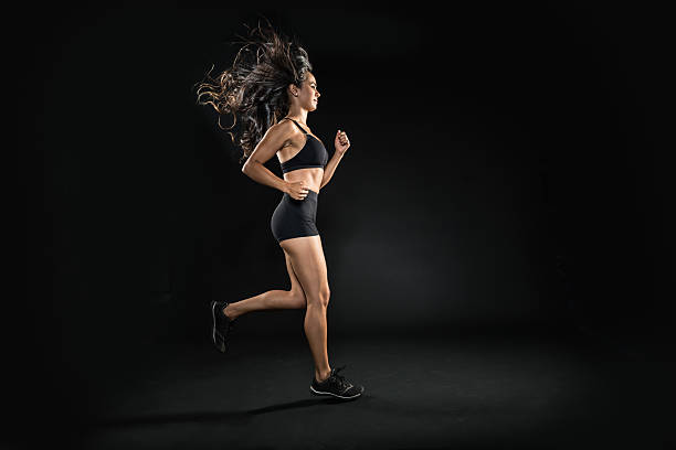 istock Hispanic Women Runner With Big Hair 595728794