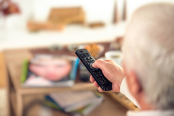 istock Defocused shot of senior man with remote control 595729448