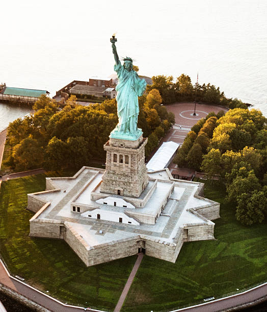 istock statue of liberty aerial view 595731104