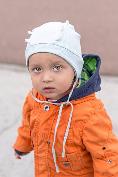 istock Little baby boy playing in the park 595731330