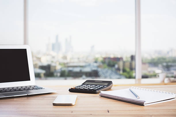 istock Wooden office desktop closeup 595731984