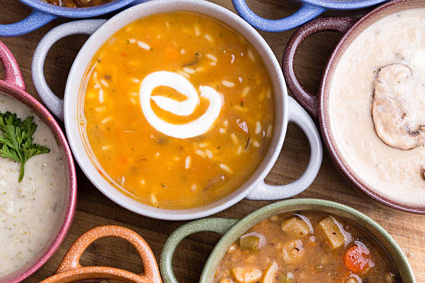istock Overhead view of soup in bowls with handles 595732280