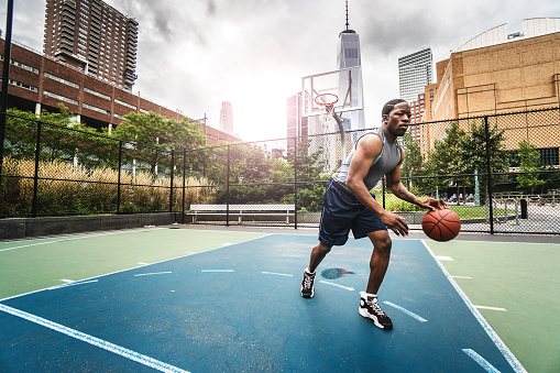 street basketball player on the court in new york city