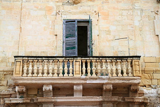 Old balcony details on historical building in Valletta, Malta