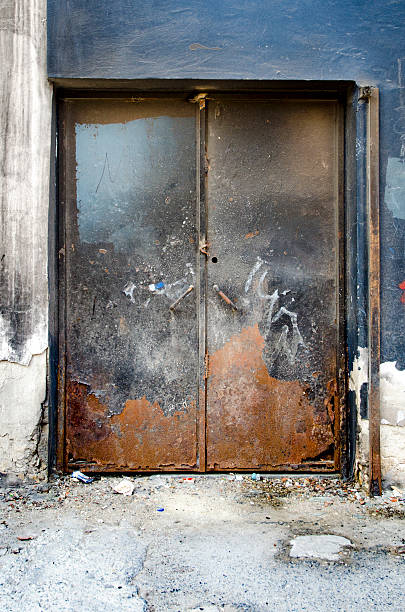 istock Rusty metal, ferrous metal plate used for security purposes. Bac 595734940
