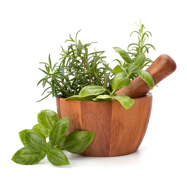 istock fresh flavoring herbs and spices in wooden mortar 595736152