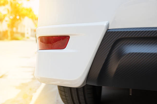 istock Closeup of a taillight on a modern white car. 595737622