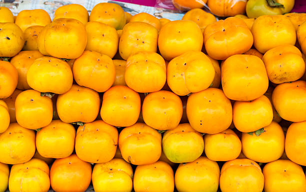 istock Orange persimmon fruits freshly 595739060