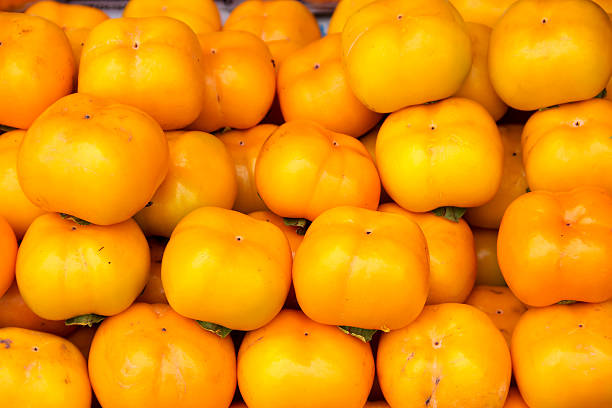 istock Orange persimmon fruits freshly 595739084