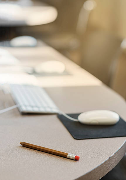 istock classroom with close up of pencil in computer lab 595742608