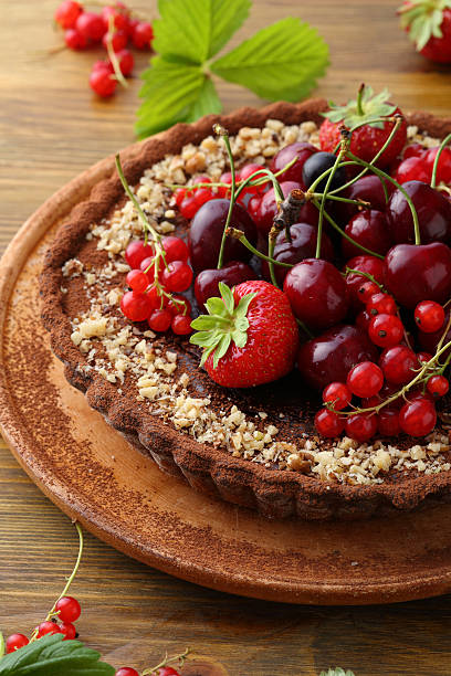 istock Pie with summer fruits on wood 595743884