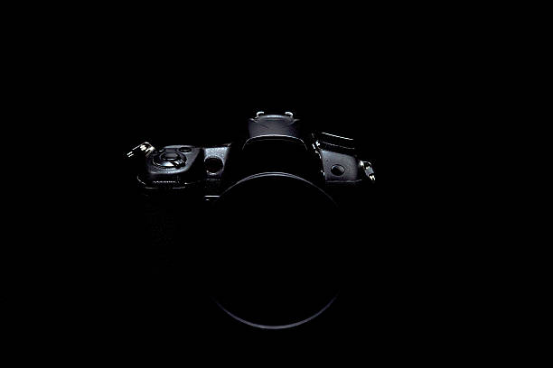istock Professional modern DSLR camera low key stock photo/image, Moder 595744588