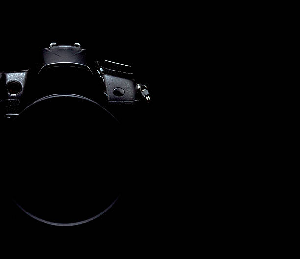 istock Professional modern DSLR camera low key stock photo/image, Moder 595744662