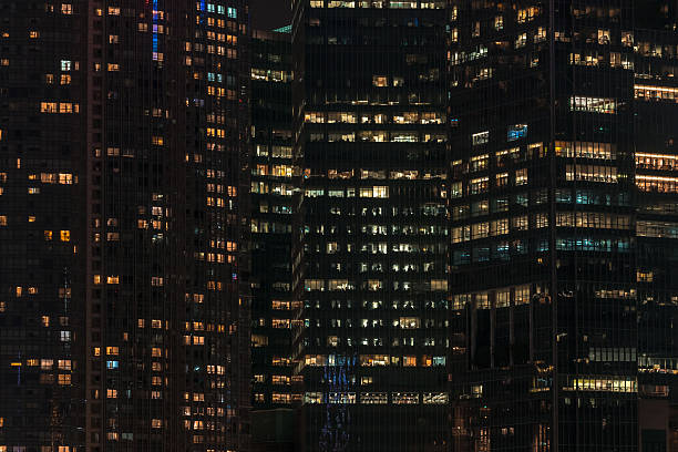 istock close up  high building at night 595745186