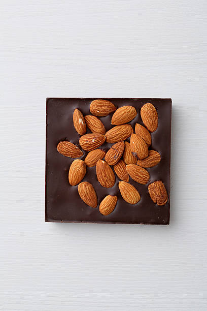 istock Block of chocolate with almond 595747368