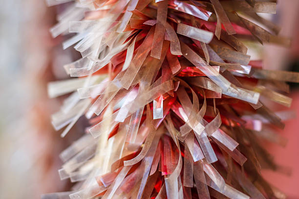 texture of the old red and white tinsel stock photo