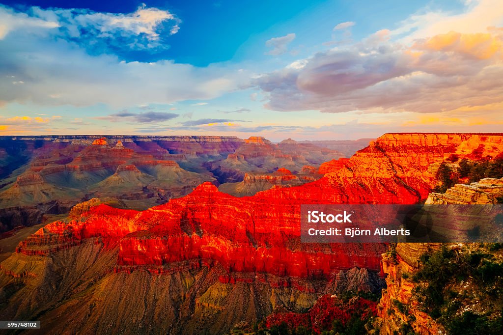 Mather Point, View Point, Grand Canyon National Park, Arizona, U Grand Canyon National Park is the United States 15th oldest national park. Named a UNESCO World Heritage Site in 1979, the park is located in northwestern Arizona. Sunset Stock Photo