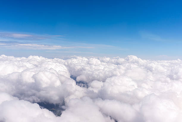 istock Look at the clouds through the porthole 595750120