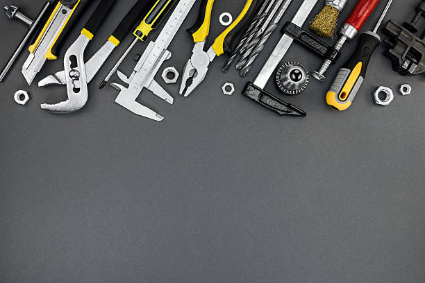 istock house renovation tools and accessories on dark grey background 595751300