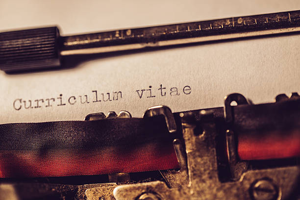 'curriculum vitae' typed using an old typewriter - typewriter typebar old macro imagens e fotografias de stock